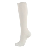 Bas de contention femme blanc en nylon sur fond blanc