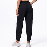 Jogging femme ample à séchage rapide