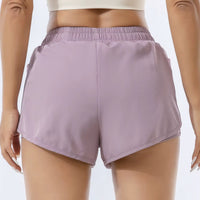 Short running femme violet à séchage rapide