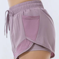 Short running femme violet à séchage rapide