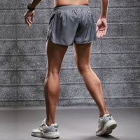 Short running homme gris avec fente