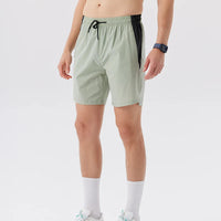 Short running homme vert à séchage rapide