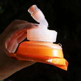 Gourde running orange et pliable